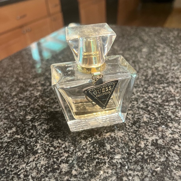 Guess Seductive perfume. Has some left in bottle. Fun and flirty. - Picture 2 of 6